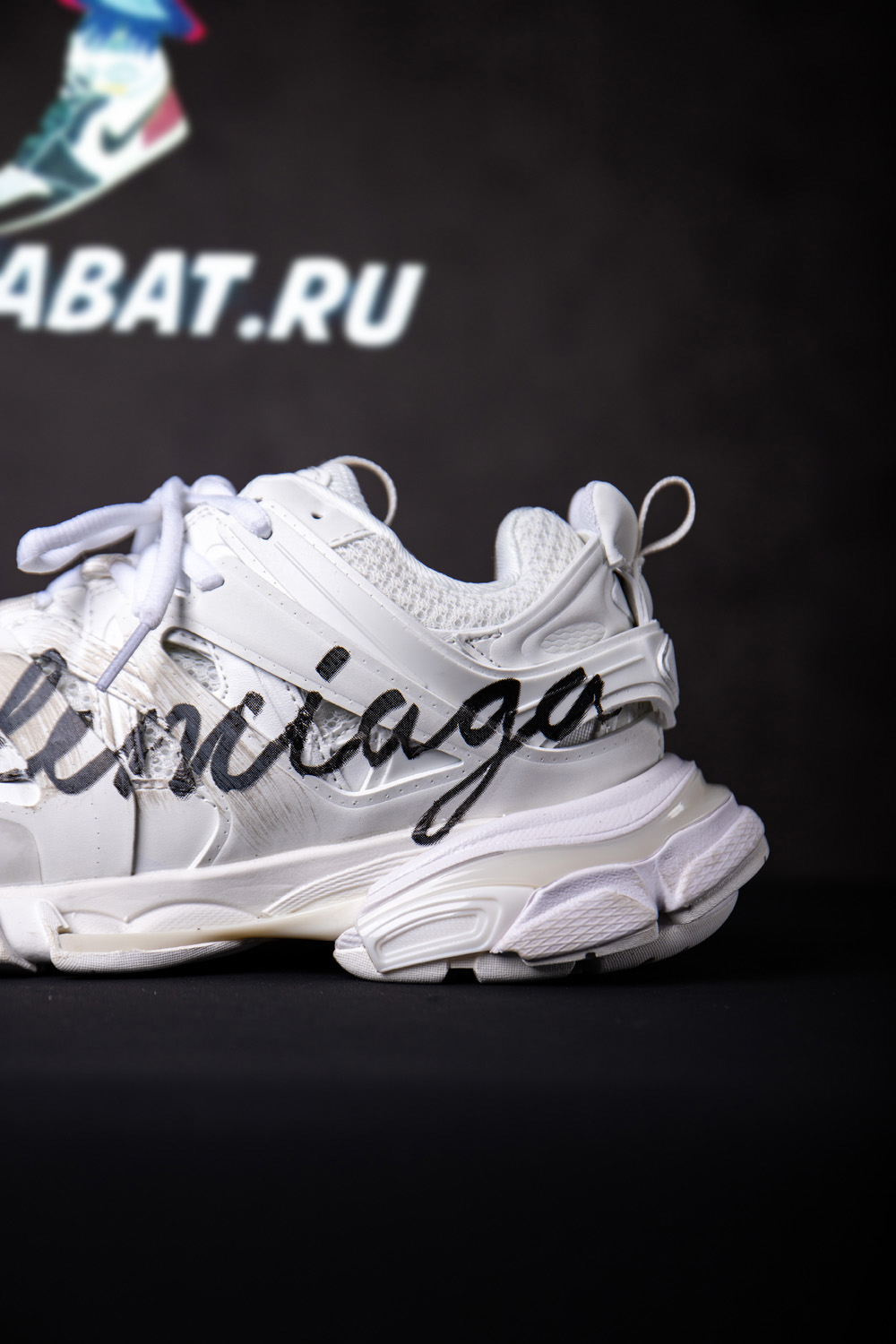 Ba*len*cia*ga track signature sneaker in white/black