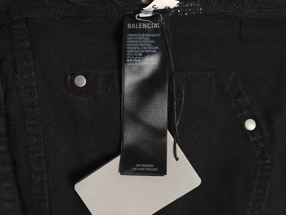 Ba*len*cia*ga distressed denim trousers with ripped pockets