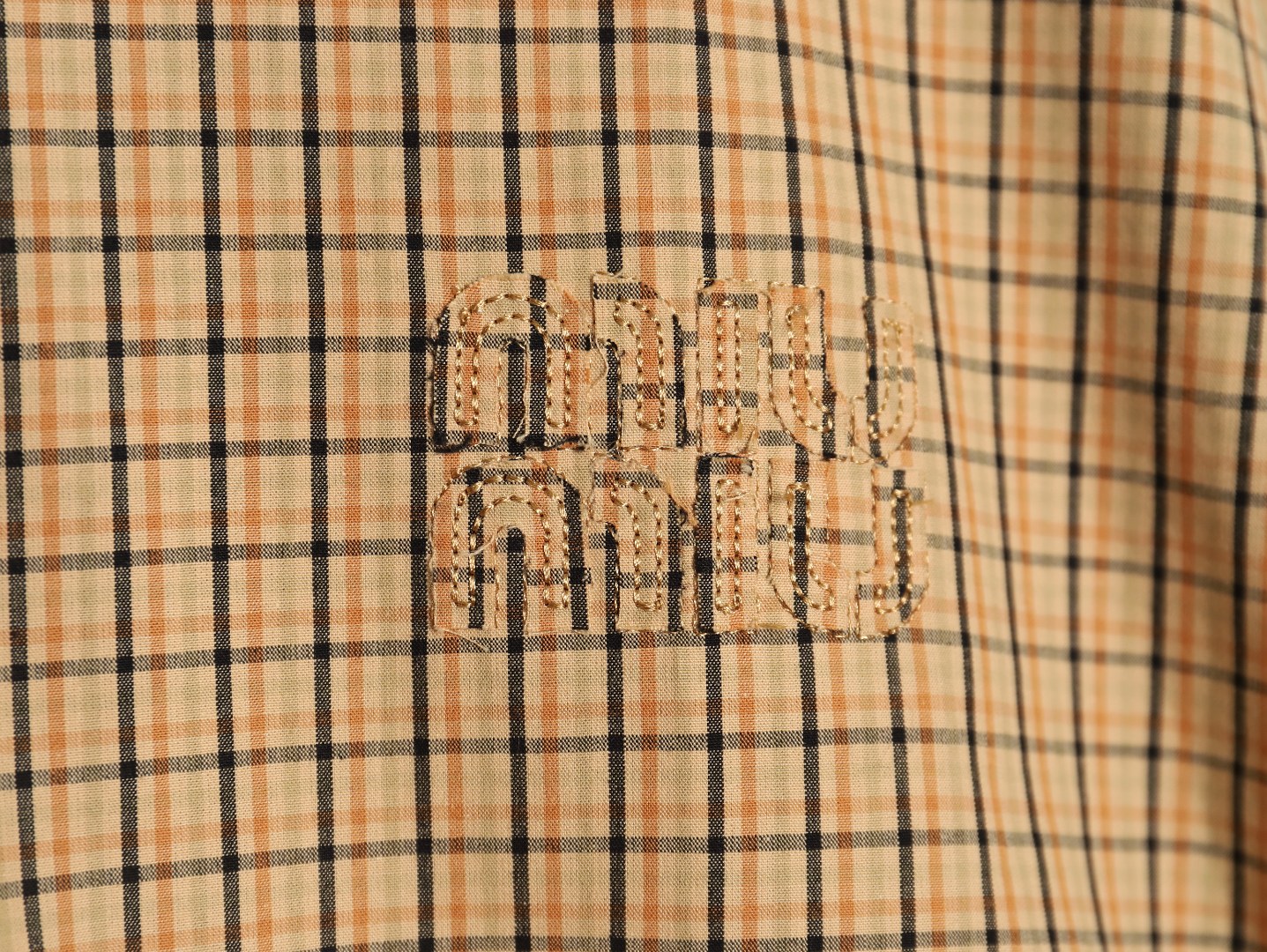 Miu Miu yellow checked jacket