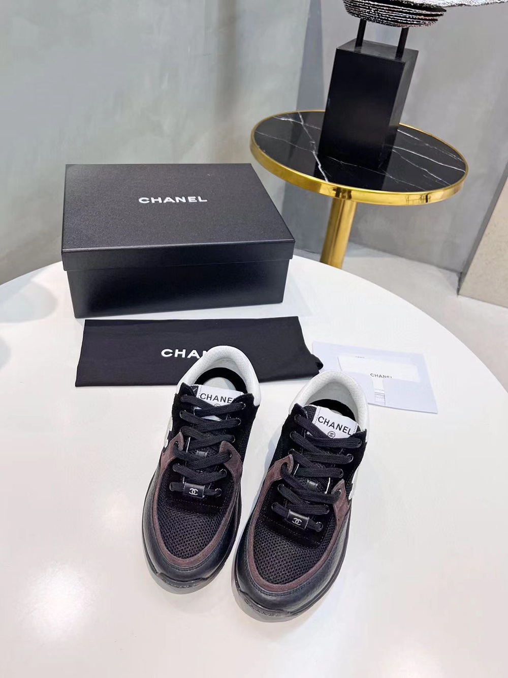 Ch*el cc low-top sneakers black & white