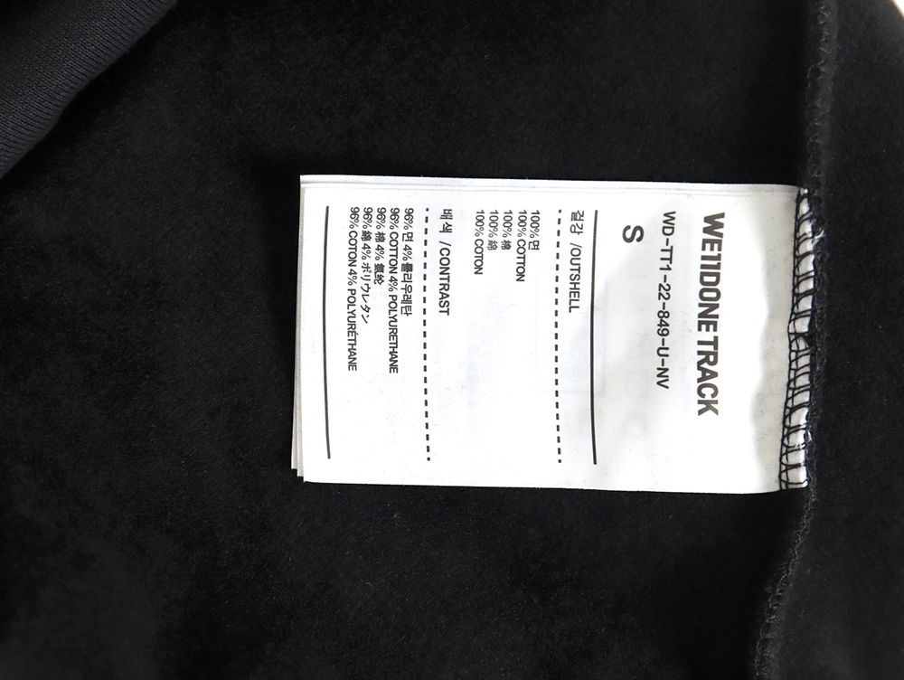 We11done co-branded Manchester United No. 11 hooded fleece sweatshirt