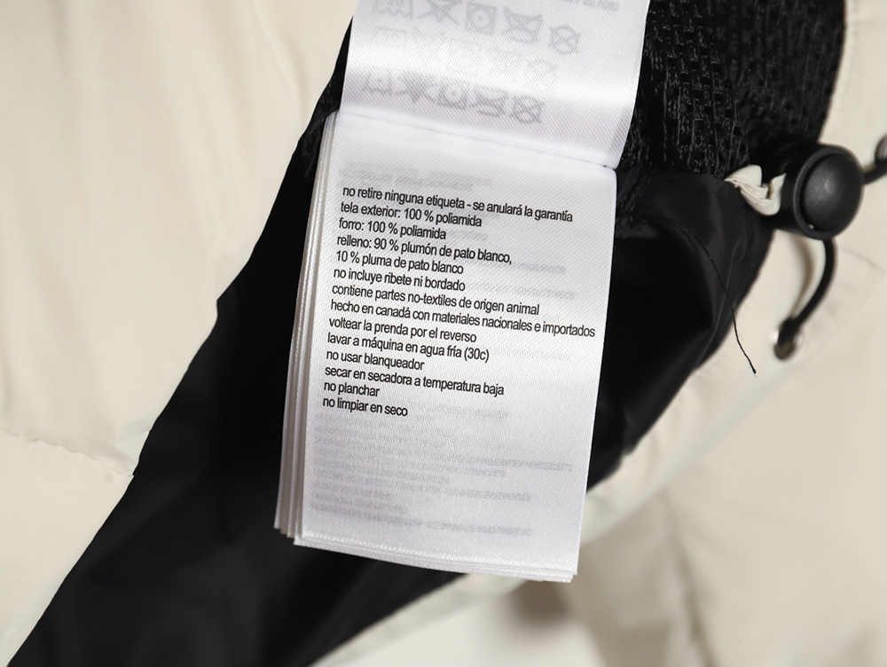 Can*a Go*e black label down jacket