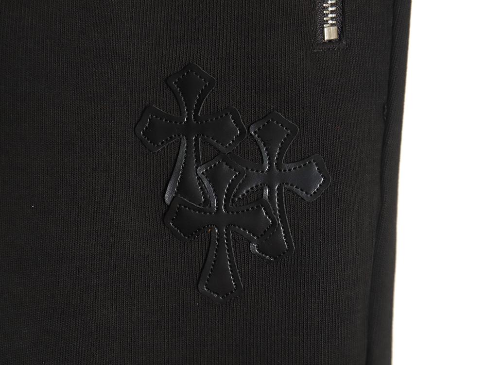 Ch**me He**ts leather cross logo trousers