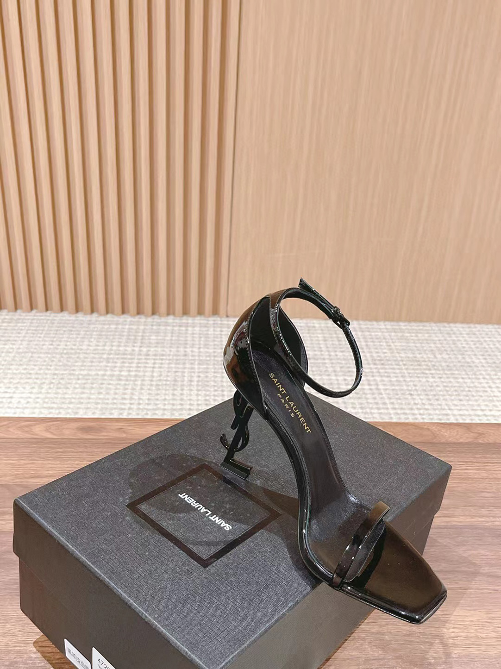 Sa**t Lau*nt opyum sandals in patent leather