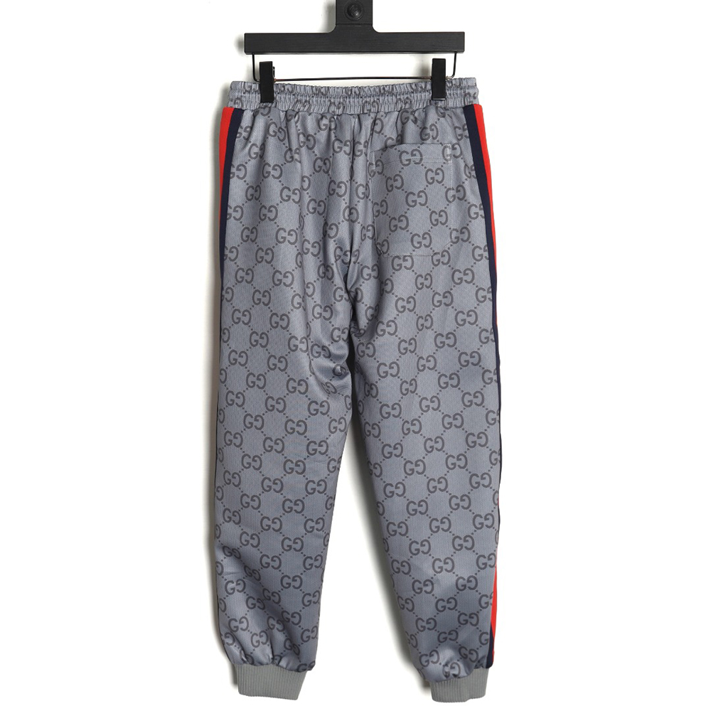 G*u*i all over print double g jacquard ribbon trousers