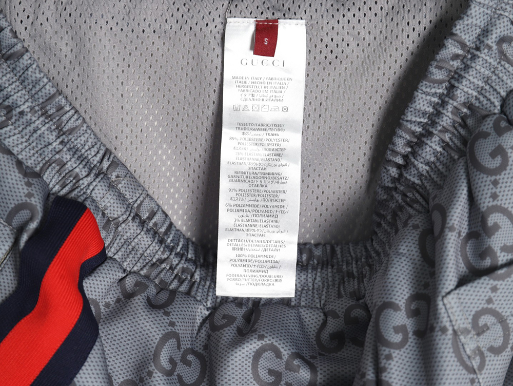 G*u*i all over print double g jacquard ribbon trousers