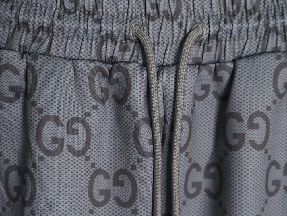 G*u*i all over print double g jacquard ribbon trousers