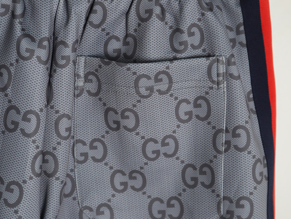 G*u*i all over print double g jacquard ribbon trousers