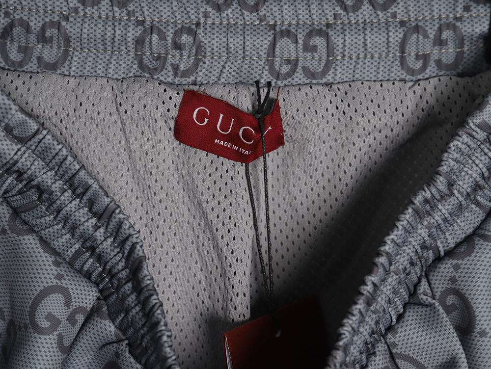 G*u*i all over print double g jacquard ribbon trousers