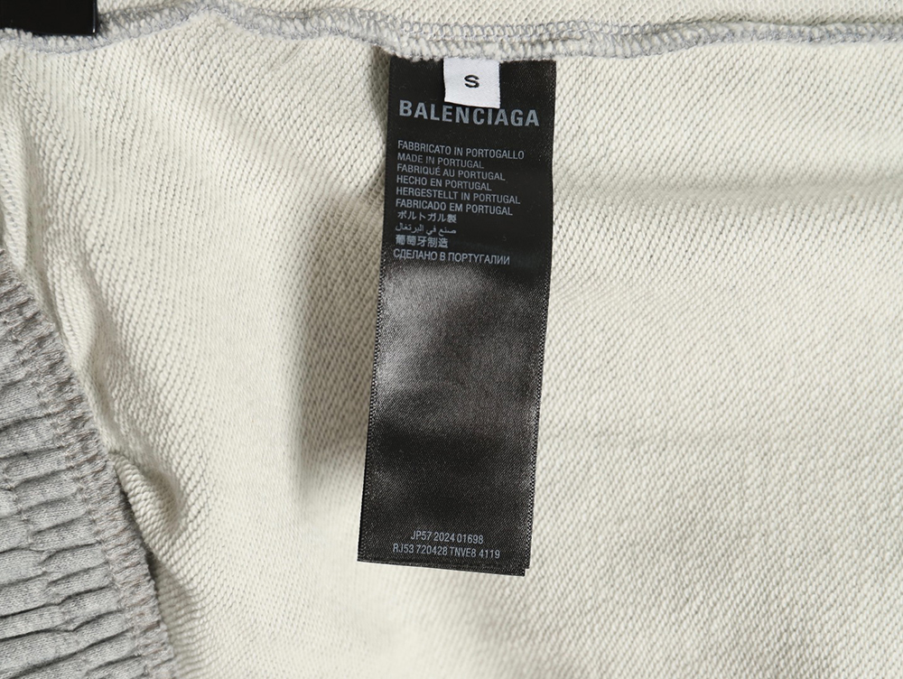 Ba*len*cia*ga earth pattern print distressed trousers