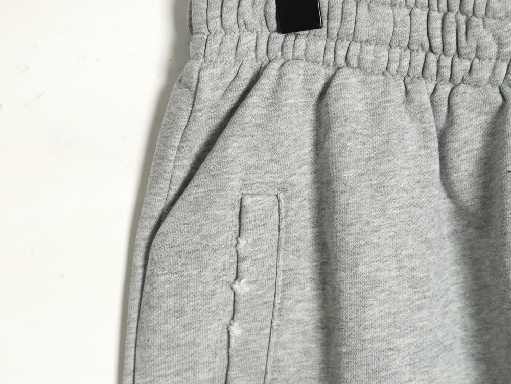 Ba*len*cia*ga earth pattern print distressed trousers