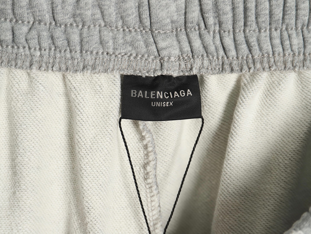 Ba*len*cia*ga earth pattern print distressed trousers