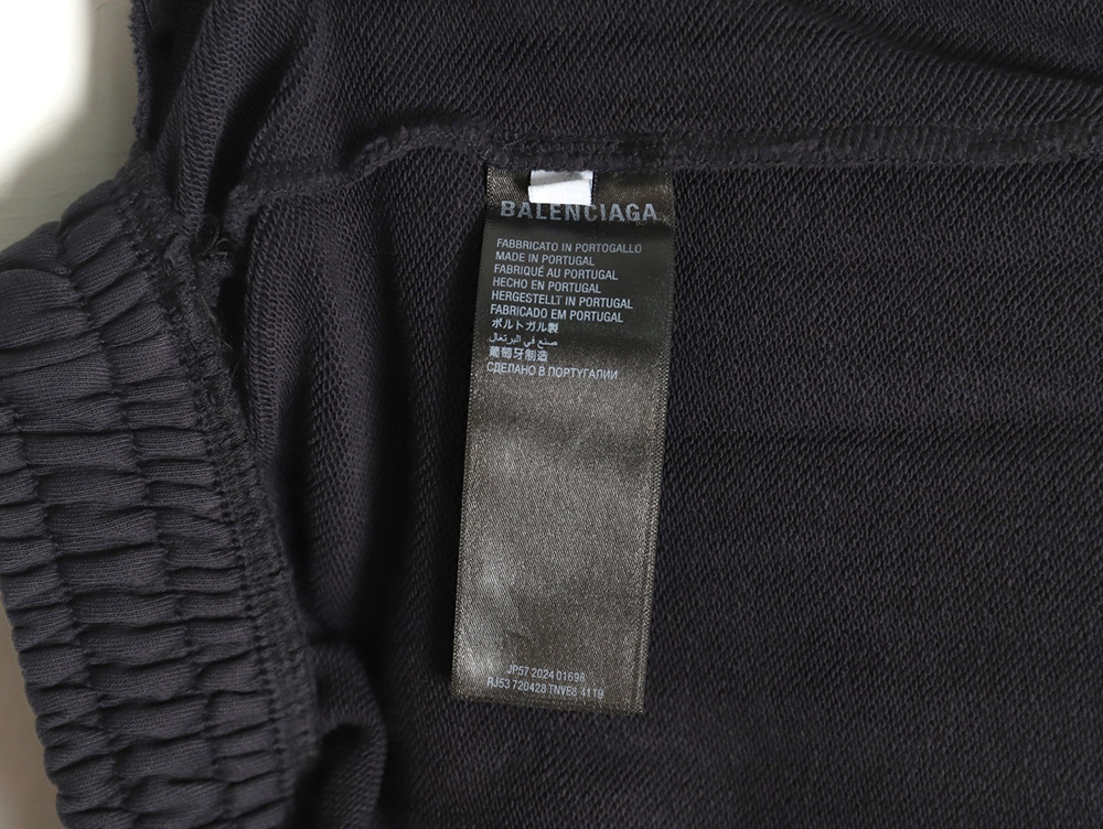 Ba*len*cia*ga earth pattern print distressed trousers tsk1