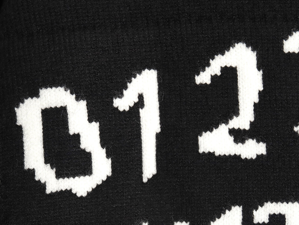 ma*s*n Ma*i*la numbers distressed knitted crewneck sweater