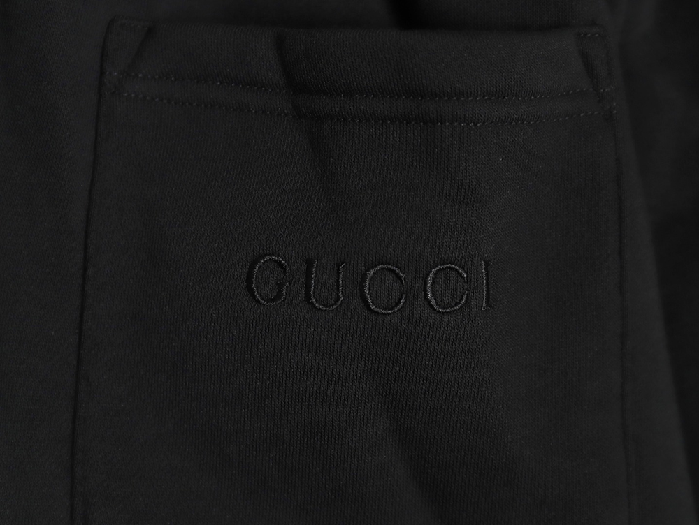 G*u*i black web trousers