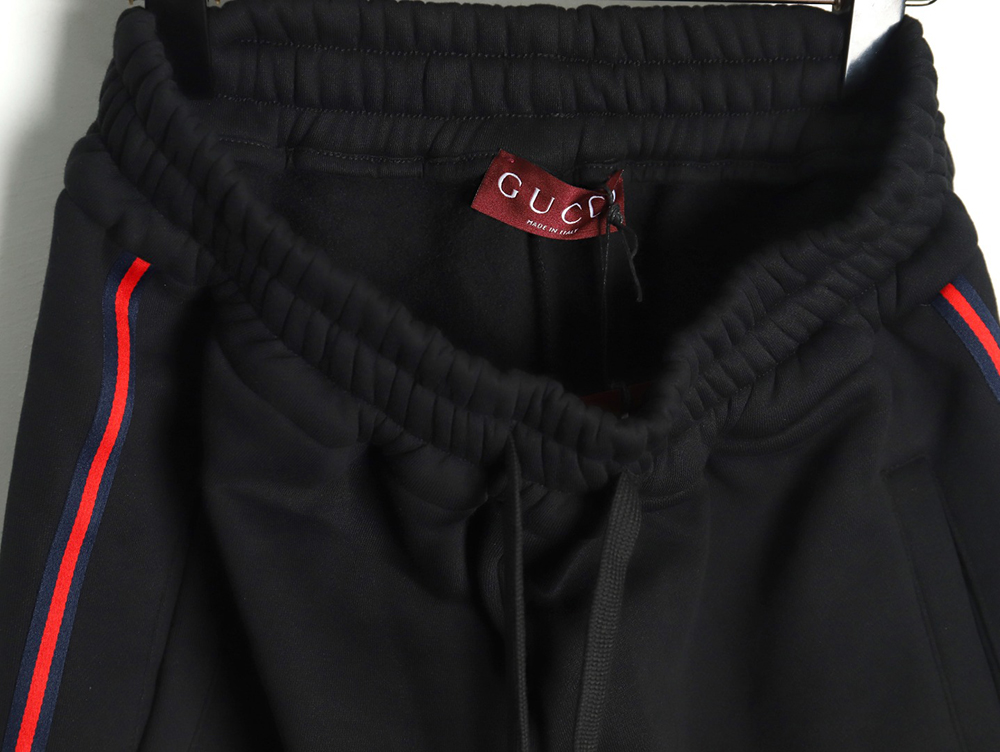 G*u*i black web trousers