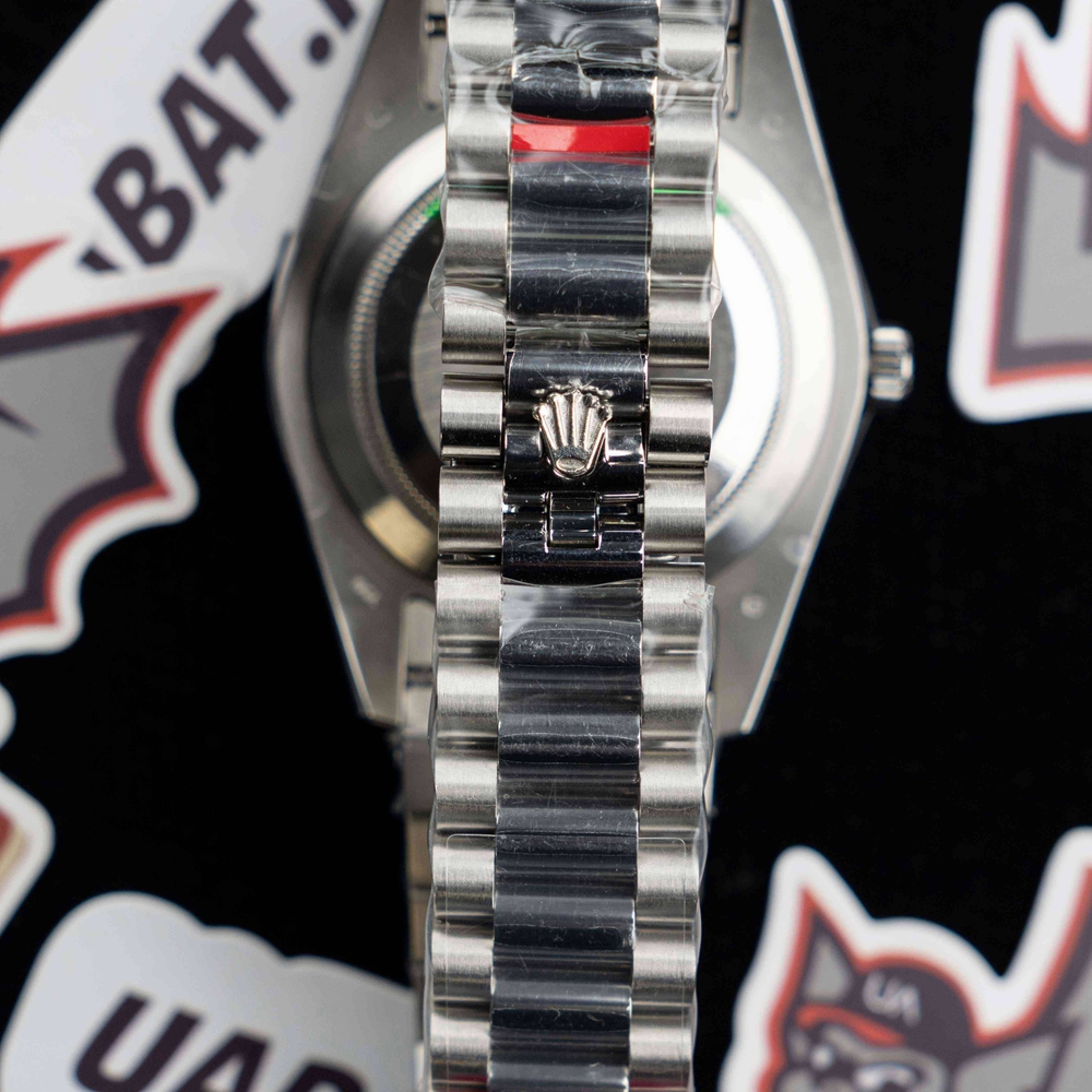 R*l*x - daydate 40mm flt ss/ss pearl wht roman bp swiss 2836