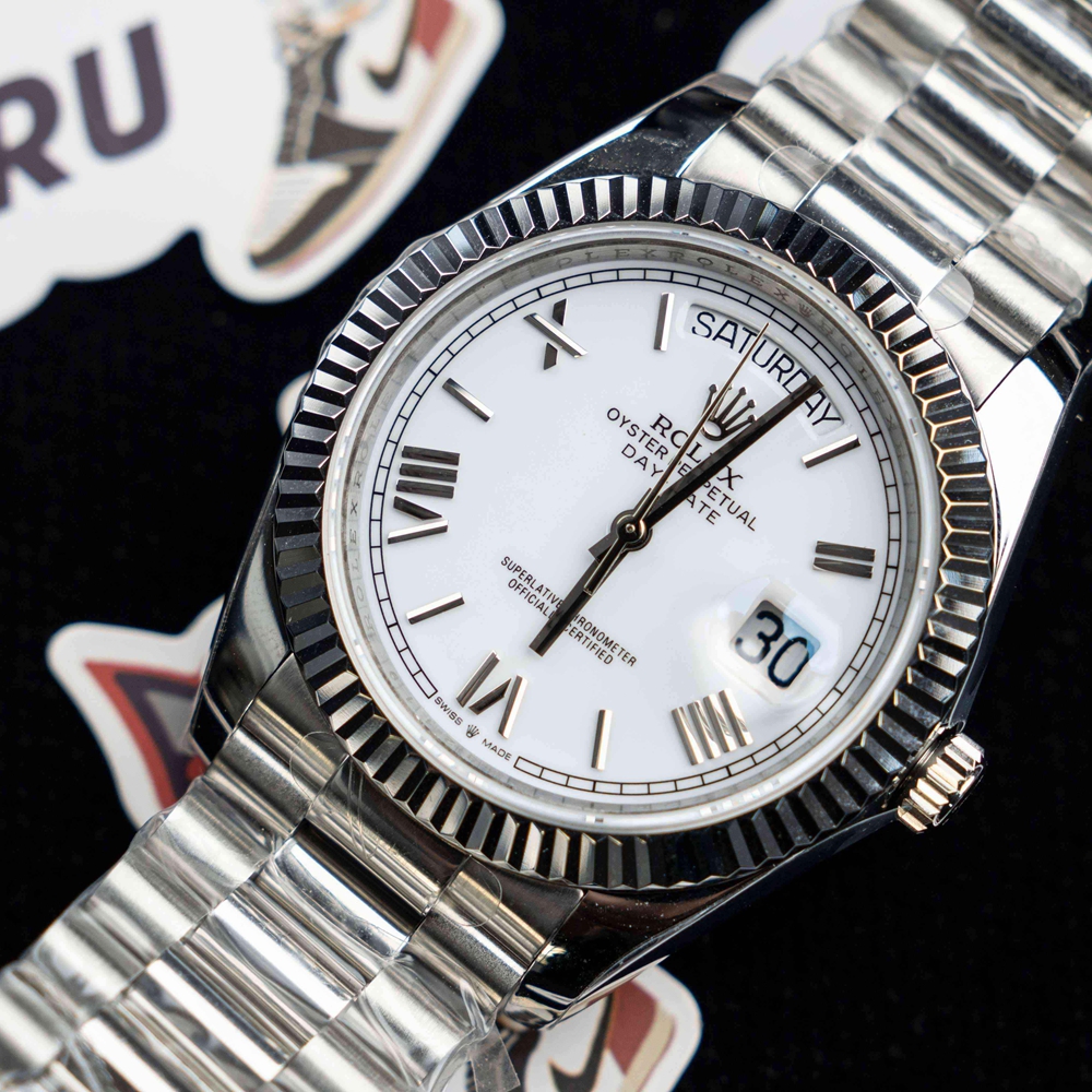 R*l*x - daydate 40mm flt ss/ss pearl wht roman bp swiss 2836
