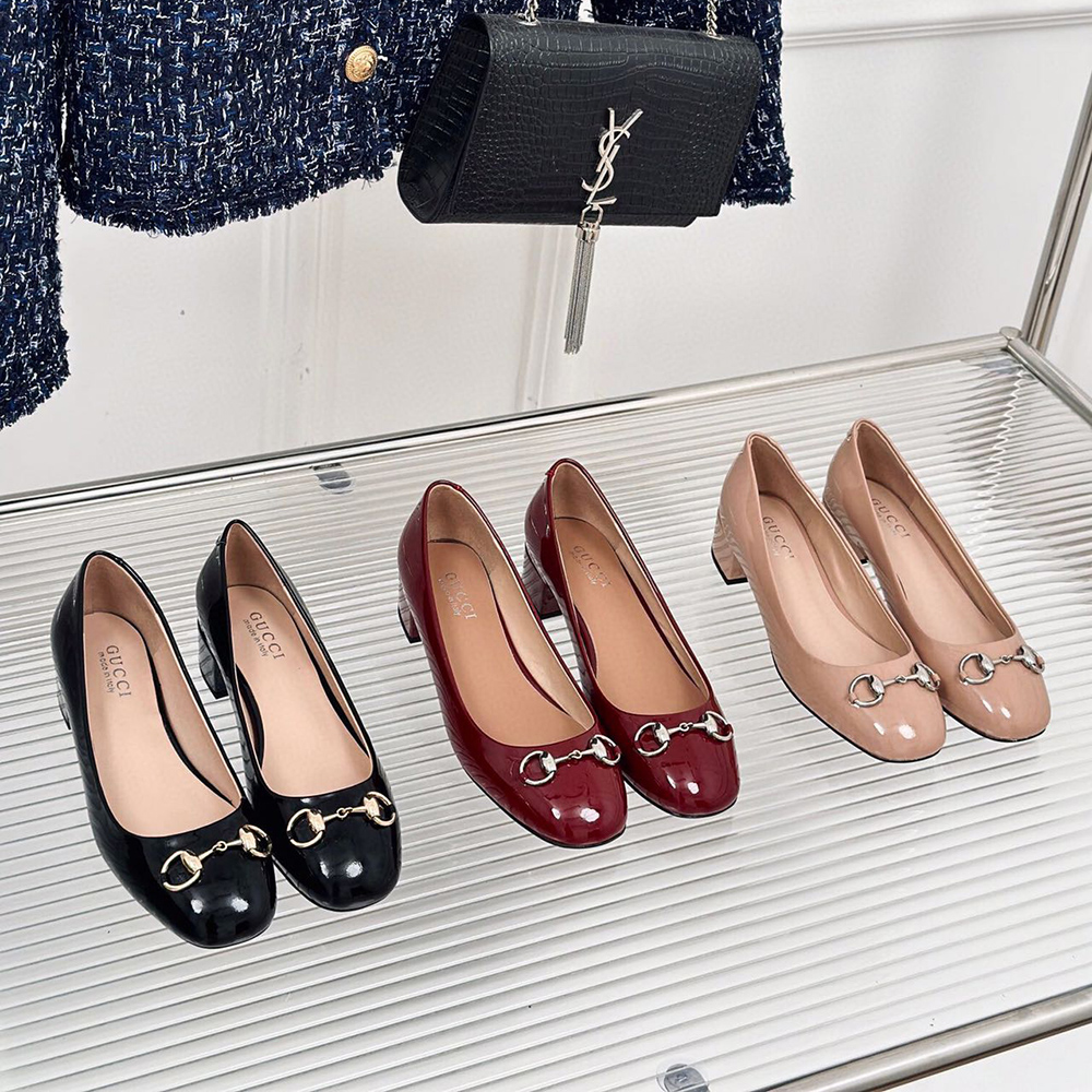 G*u*i horsebit black patent leather low heels