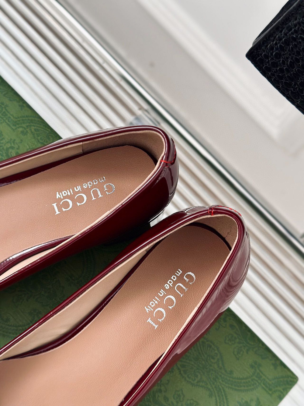 G*u*i horsebit black patent leather low heels