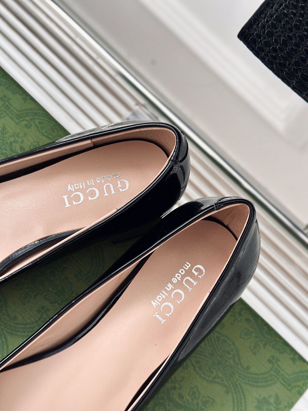 G*u*i horsebit black patent leather low heels