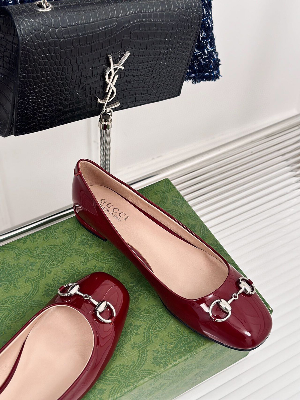 G*u*i horsebit black patent flats