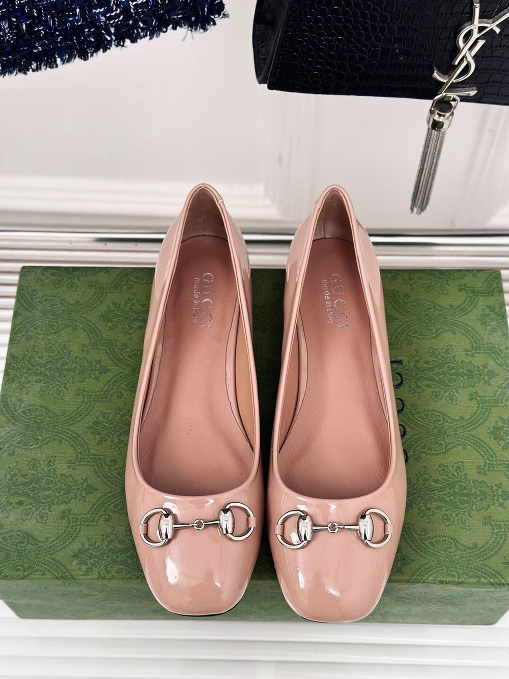 G*u*i horsebit black patent flats