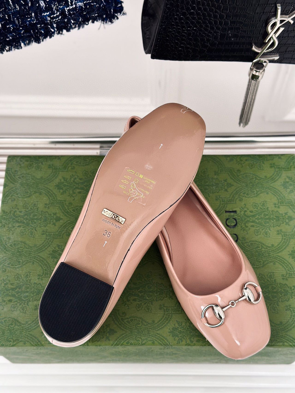 G*u*i horsebit black patent flats