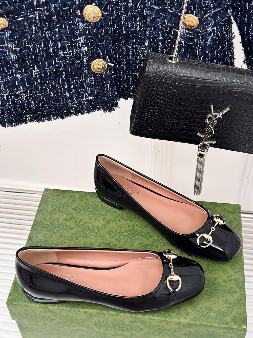 G*u*i horsebit black patent flats