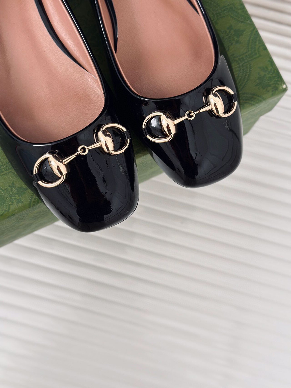 G*u*i horsebit black patent flats