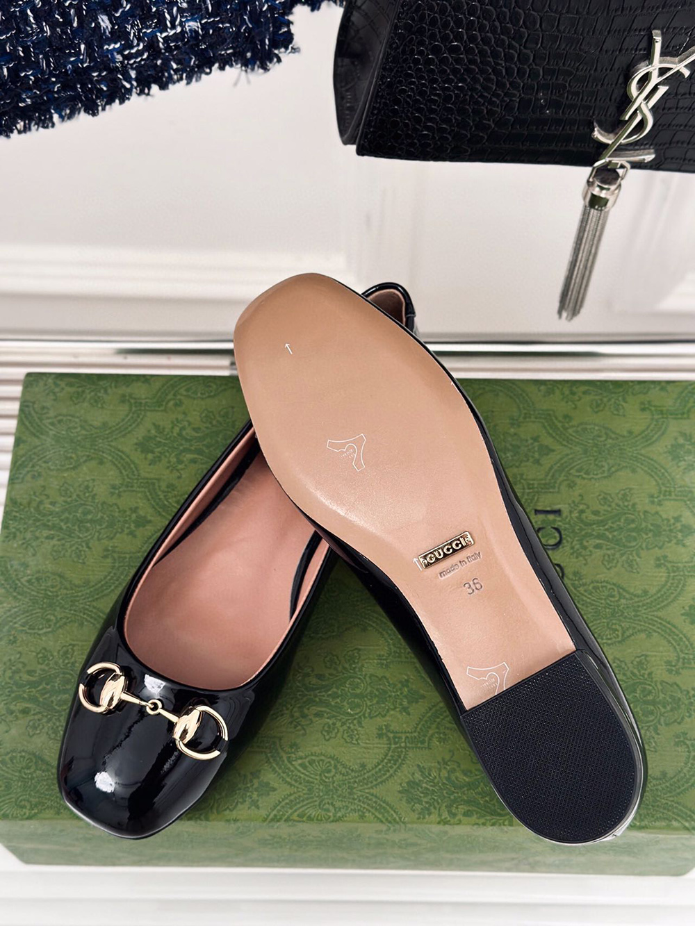 G*u*i horsebit black patent flats