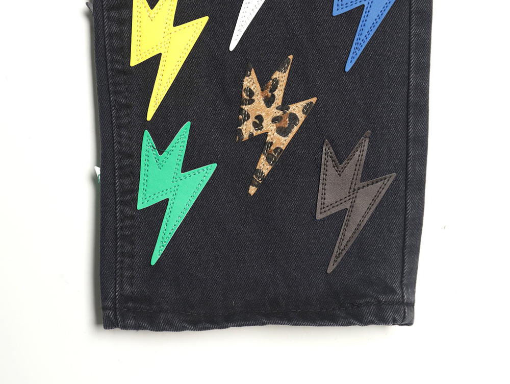 Amexnocap leather label lightning bolt denim trousers