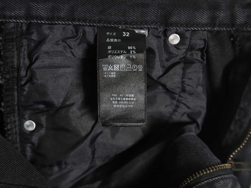 Amexnocap leather label lightning bolt denim trousers