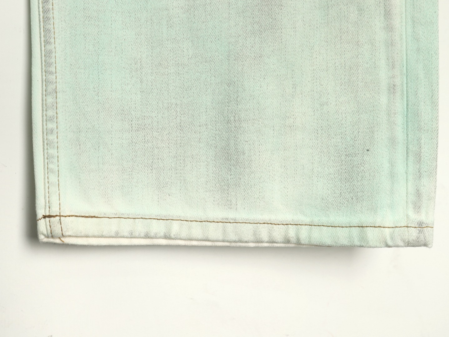 Acne studios irregular distressed handmade glow-in-the-dark jeans