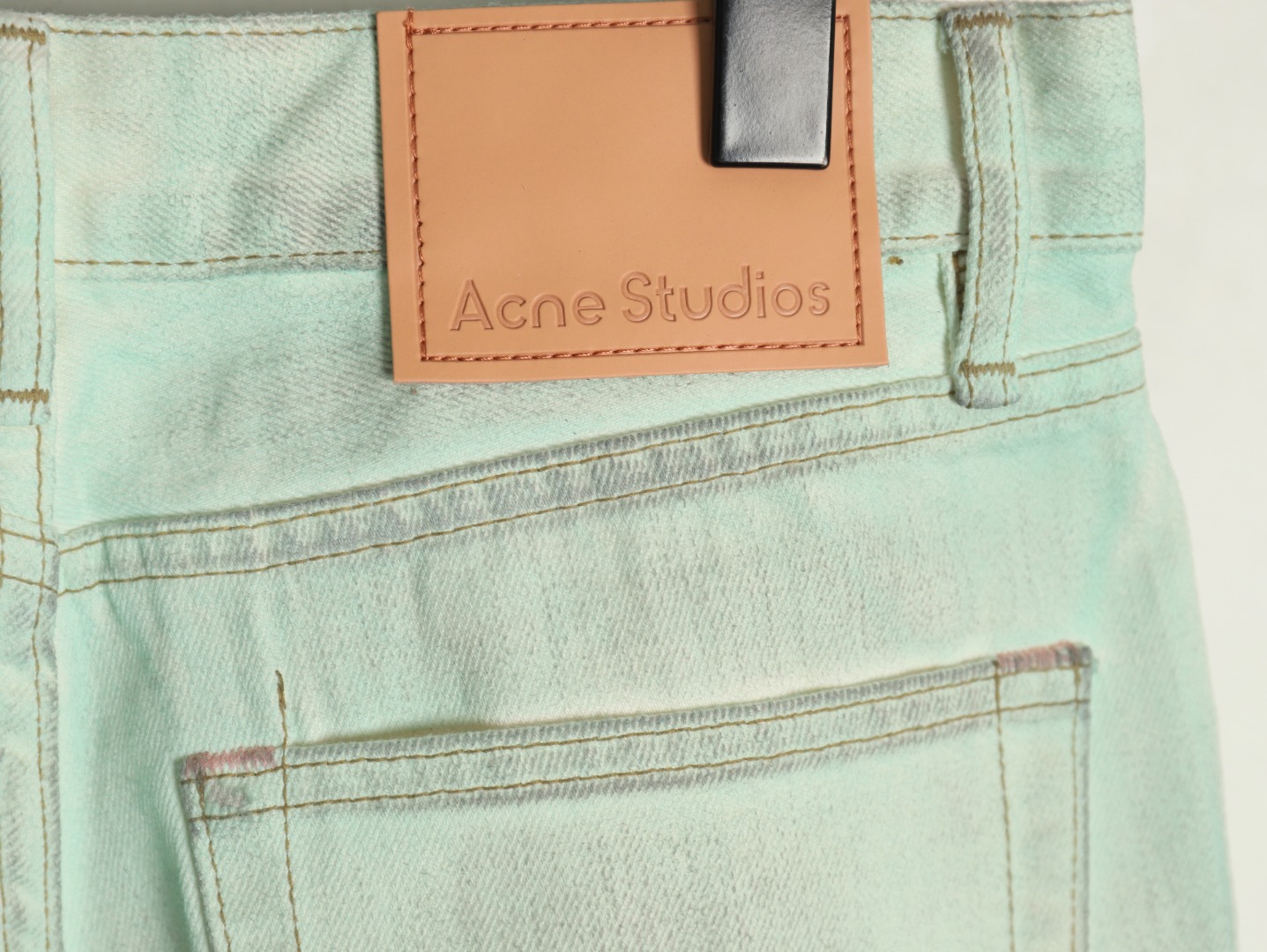 Acne studios irregular distressed handmade glow-in-the-dark jeans