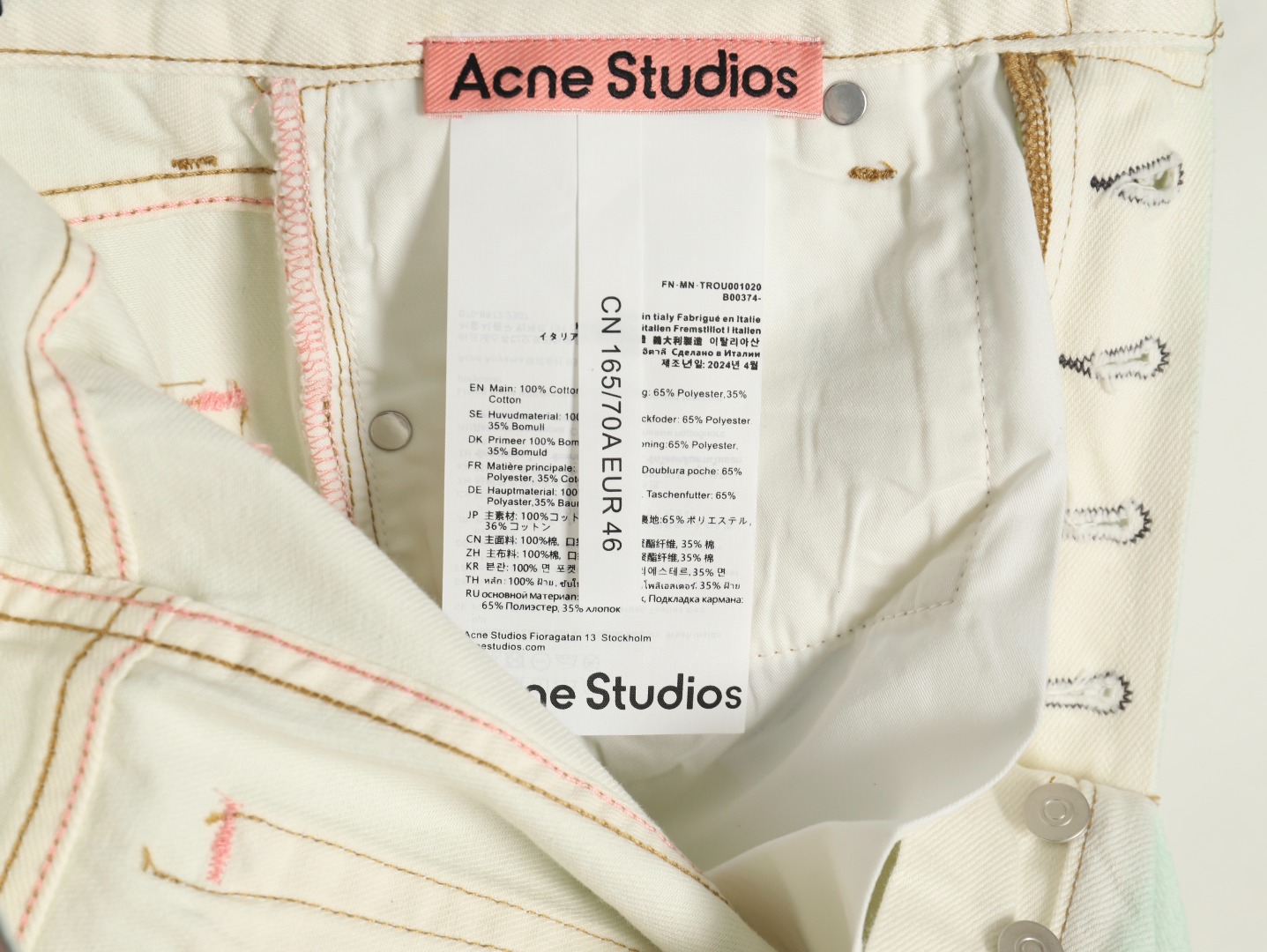 Acne studios irregular distressed handmade glow-in-the-dark jeans