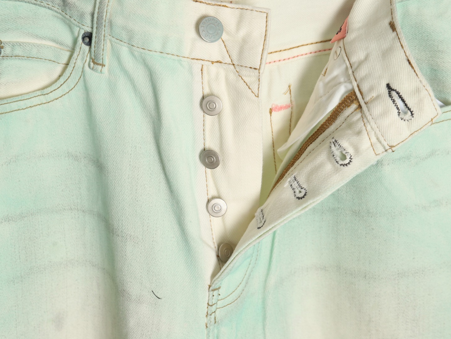 Acne studios irregular distressed handmade glow-in-the-dark jeans