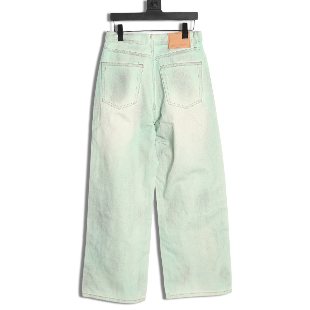 Acne studios irregular distressed handmade glow-in-the-dark jeans