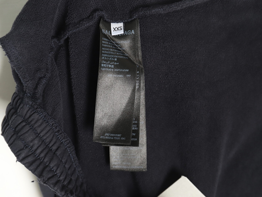 Ba*len*cia*ga heavyweight batik washed embroidered wide-leg trousers