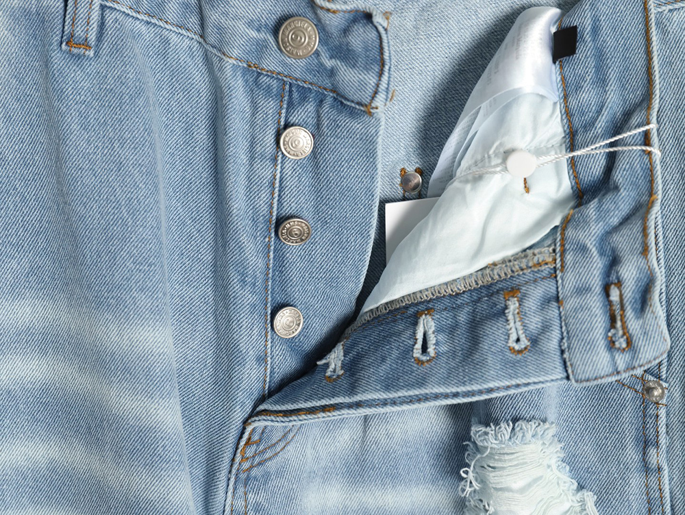 ma*s*n Ma*i*la distressed graffiti denim trousers