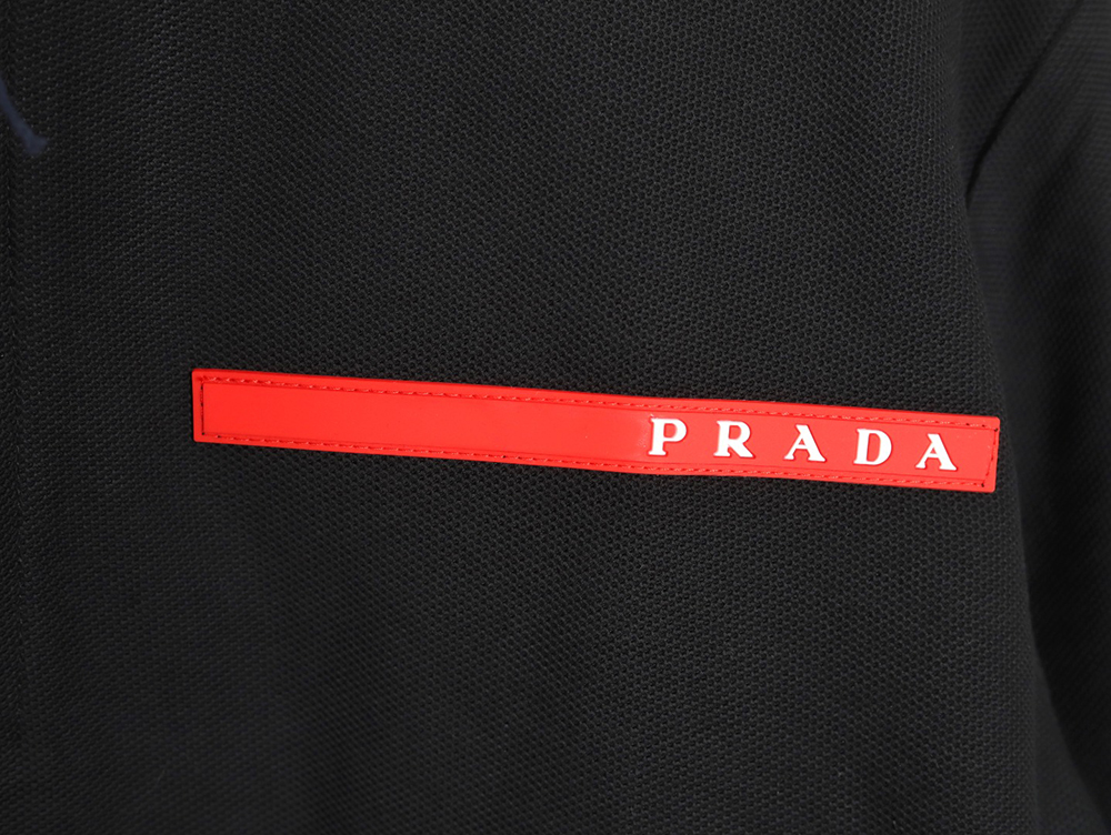 Pra*a red stripe triangle half zip short sleeve polo shirt