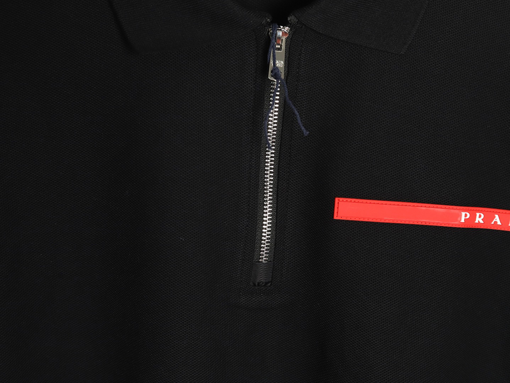 Pra*a red stripe triangle half zip short sleeve polo shirt