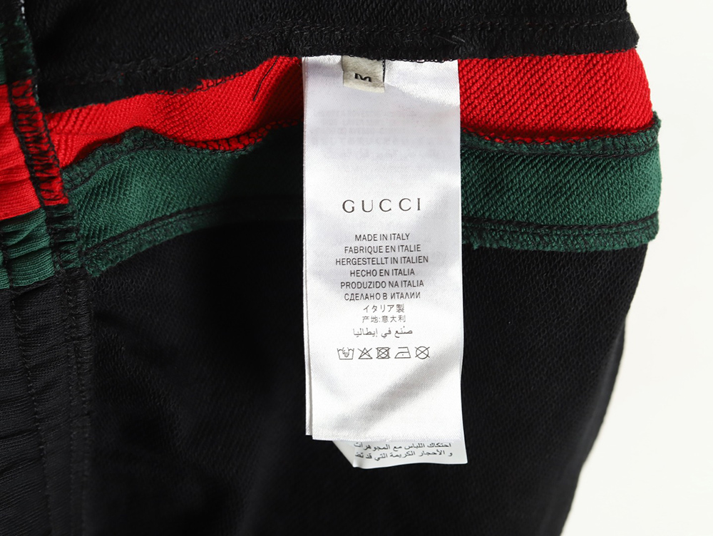 G*u*i side webbing double g embroidered lettering shorts