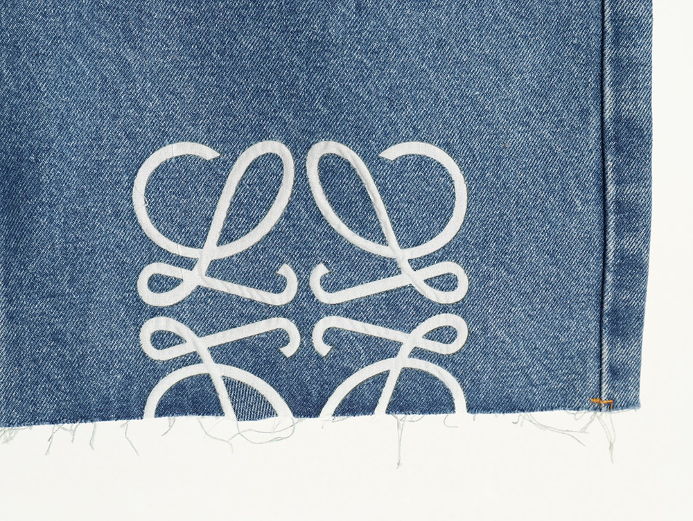 L0ew* half-embroidered denim shorts