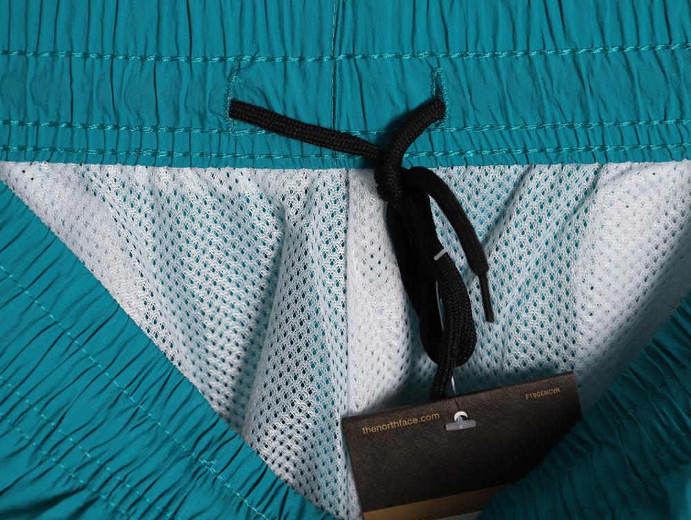 the nor*h F**e lettering print shorts