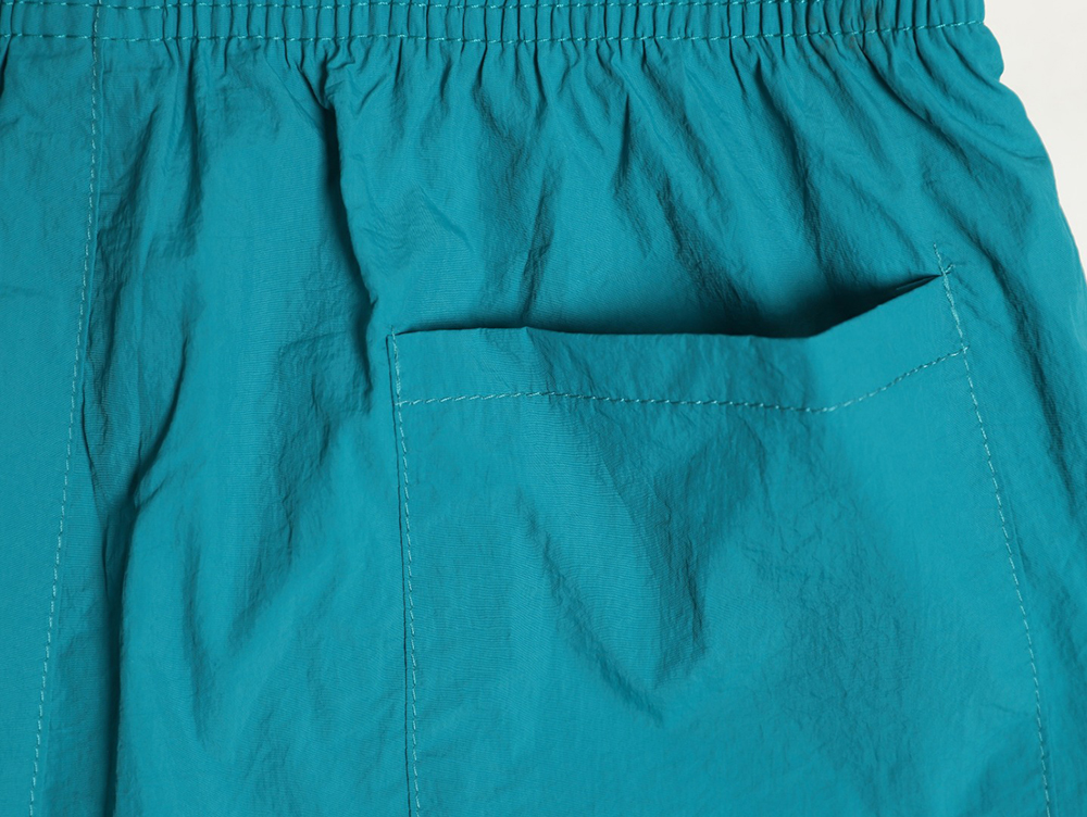 the nor*h F**e lettering print shorts