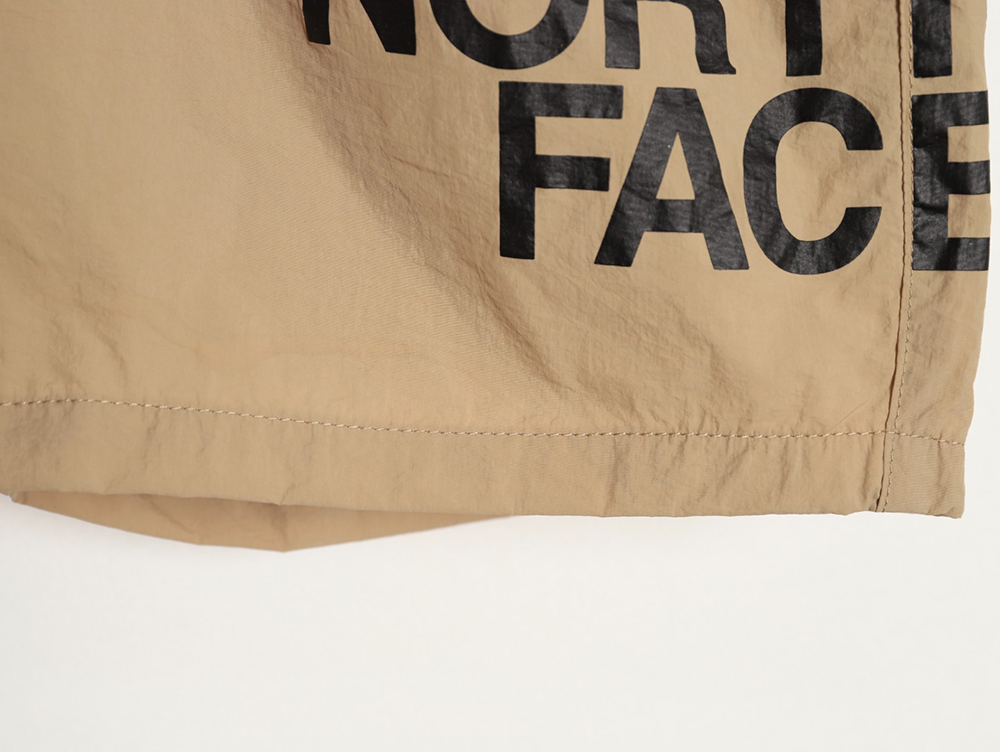 the nor*h F**e lettering print shorts tsk1