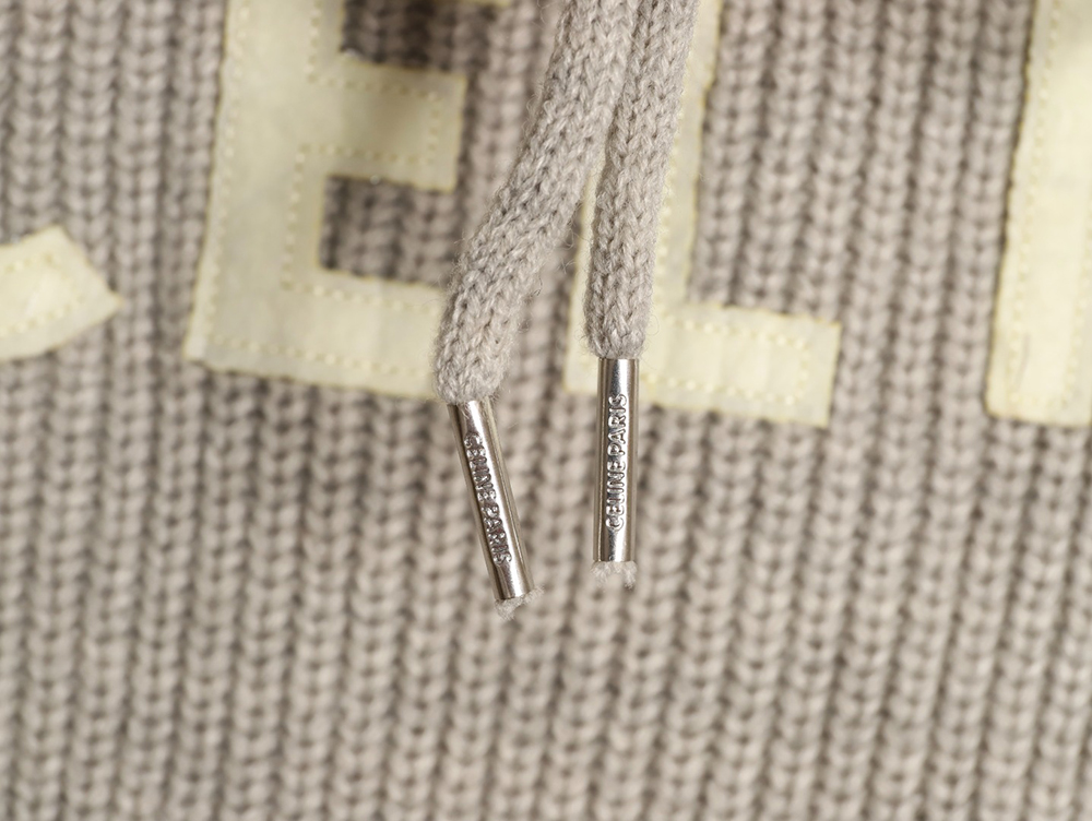 Ce**e hooded knitted sweater with lettering on the chest