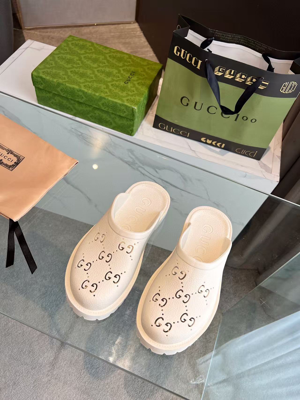 G*u*i slip-on sandal cut out monogram 