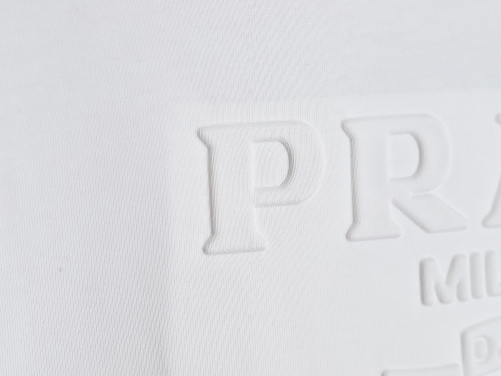 Pra*a embossed logo short-sleeved shirt